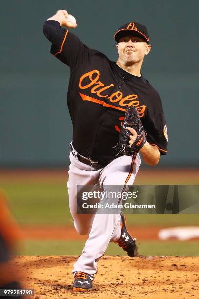 Chris Tillman of the Baltimore Orioles pitches in the first inning of a game against the Boston Red Sox at Fenway Park on April 13, 2018 in Boston,...