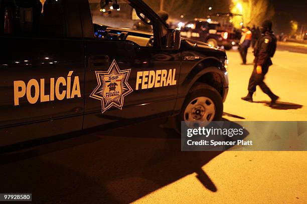 Mexican police investigate a violent incident on March 21, 2010 in Juarez, Mexico. The border city of Juarez has been racked by violent drug related...