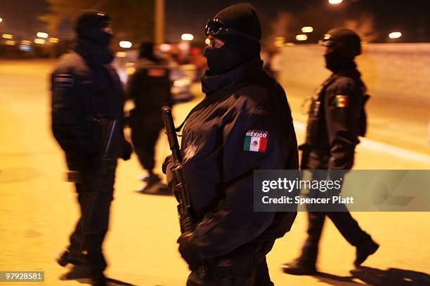 Mexican police investigate a violent incident on March 21, 2010 in Juarez, Mexico. The border city of Juarez has been racked by violent drug related...