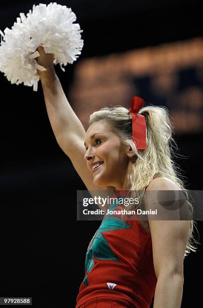An Ohio State Buckeyes cheerleader looks on before the Buckeyes take on the Georgia Tech Yellow Jackets during the second round of the 2010 NCAA...