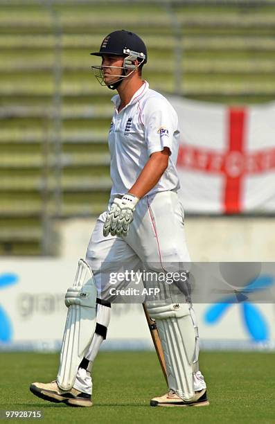 England cricketer Jonathan Trott leaves the field after loosing his wicket during the third day of the second test match between Bangladesh and...