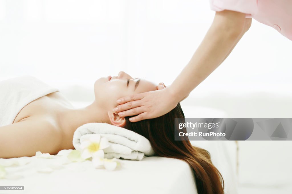 Woman enjoying head massage