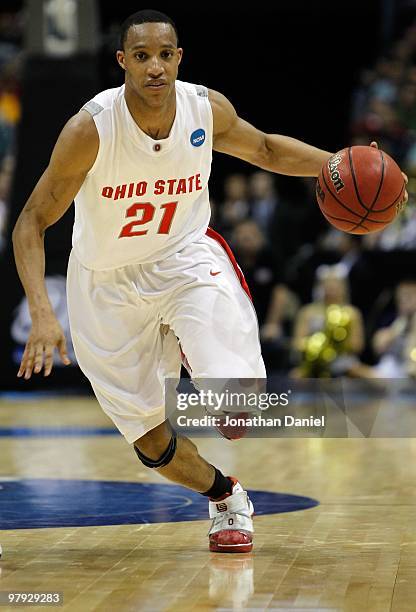 Evan Turner of the Ohio State Buckeyes moves the ball while taking on the Georgia Tech Yellow Jackets in the first half during the second round of...