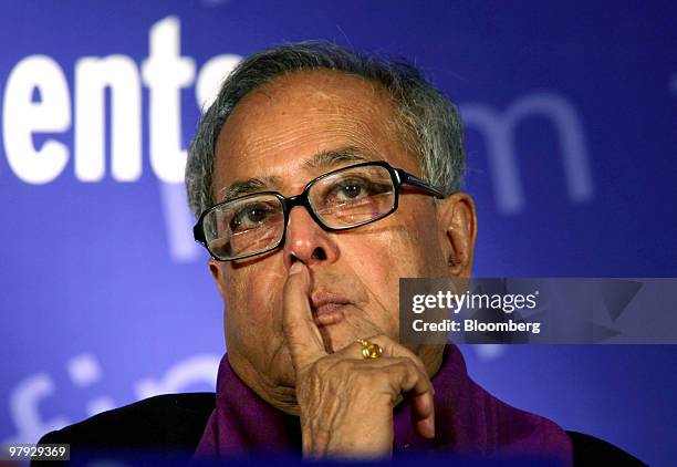 Pranab Mukherjee, India's finance minister, pauses during a Reserve Bank Of India and Organization for Economic Co-operation and Development...