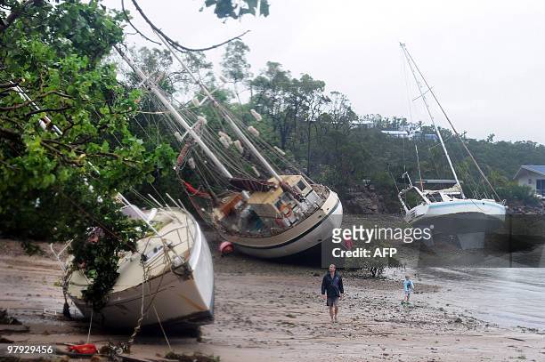 Yachts litter the shoreline after being washed ashore by Cyclone Ului at Shute Harbour near Airlie Beach along the Queensland state coast on March...