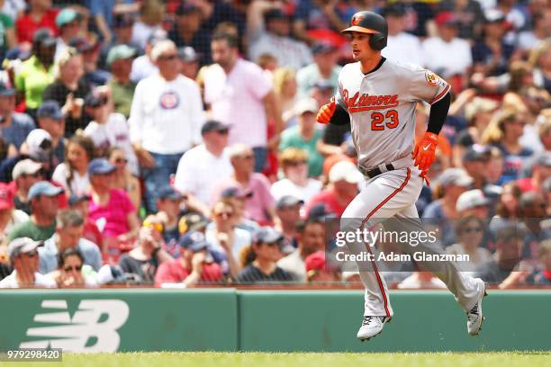 Joey Rickard of the Baltimore Orioles runs home during a game against the Boston Red Sox at Fenway Park on May 20, 2018 in Boston, Massachusetts.