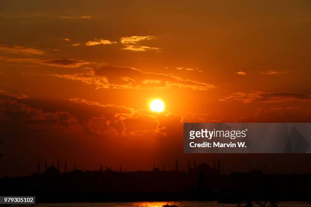 the sun over istanbul - dramatic weather over istanbul stock pictures, royalty-free photos & images