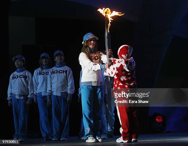 The Paralympic torch is passed from Vancouver to Sochi for the 2014 games during the Closing Ceremony on Day 10 of the 2010 Vancouver Winter...