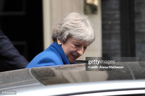 Prime Minister Theresa May leaves Downing Street ahead of Prime Minister's Questions on June 20, 2018 in London, England. MPs vote today on the...