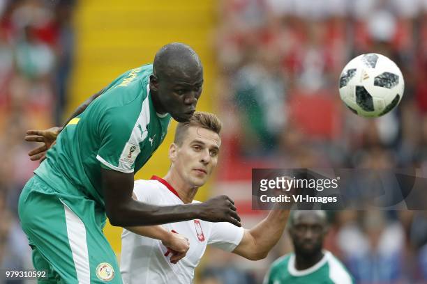 Kalidou Koulibaly of Senegal, Arkadiusz Milik of Poland during the 2018 FIFA World Cup Russia group H match between Poland and Senegal at the...
