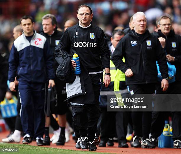 Aston Villa Manager Martin O'Neill walks back to the dressing room at half time during the Barclays Premier League match between Aston Villa and...