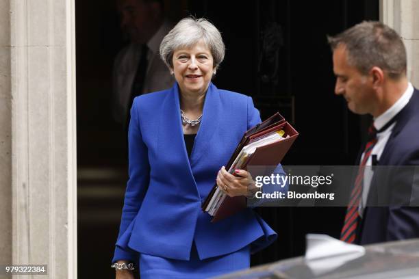 Theresa May, U.K. Primer minister, departs number 10 Downing Street to attend a weekly questions and answers session in Parliament in London, U.K.,...