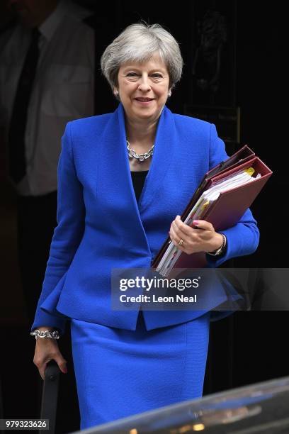 Prime Minister Theresa May leaves Downing Street ahead of Prime Minister's Questions on June 20, 2018 in London, England. MPs vote today on the...