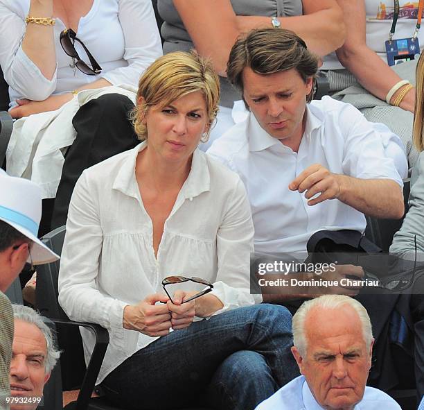 French Actress Michelle Laroque and Former French interior minister Francois Baroin attend The French Open 2009 at Roland Garros Stadium on May 31,...