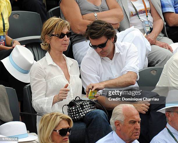 French Actress Michelle Laroque and Former French interior minister Francois Baroin attend The French Open 2009 at Roland Garros Stadium on May 31,...