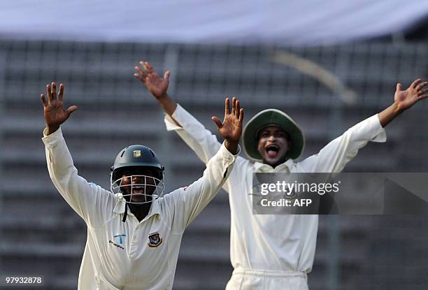 England cricketer Ian Bell leaves the field after loosing his wicket during the third day of the second Test match between Bangladesh and England at...