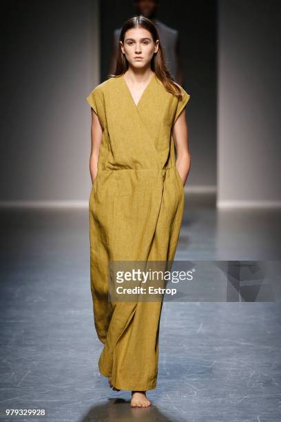 Model walks the runway at the Sartorial Monk show during Milan Men's Fashion Week Spring/Summer 2019 on June 18, 2018 in Milan, Italy.