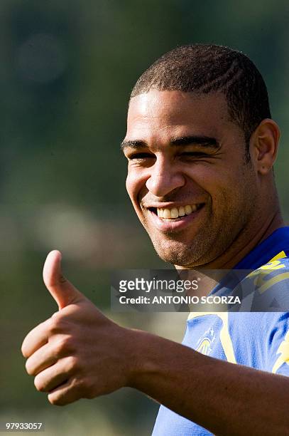 Brazilian midfielder Adriano gives his thumb up during a training session in Teresopolis on September 01, 2009. Brazil faces Argentina next 05...