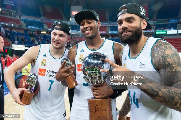 Real Madrid Luka Doncic, Trey Thompkins and Jeffery Taylor celebrating the championship during Liga Endesa Finals match between Kirolbet Baskonia and...