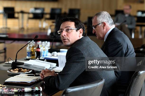 Martin Bader , manager of 1.FC Nuernberg, and the club's lawyer Christopf Schickhardt wait for the process against 1.FC Nuernberg at the court of the...