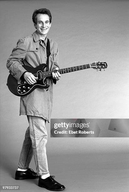 Alex Chilton posed with guitar in the photographer's studio in New York City on September 01 1987