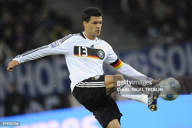 Germany's midfielder Michael Ballack kicks the ball during the 2010 World Cup qualifier match Germany vs Finland in the northern German city of...