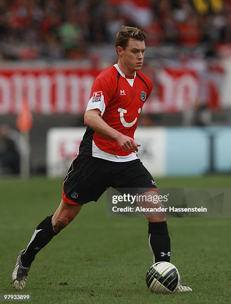 Hanno Balitsch of Hannover runs with the ball during the Bundesliga match between VfB Stuttgart and Hannover 96 at Mercedes-Benz Arena on March 20,...