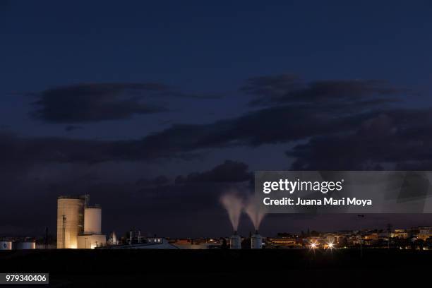 cement factory and oil factory. in the province of jaén, spain - jaen province stock-fotos und bilder