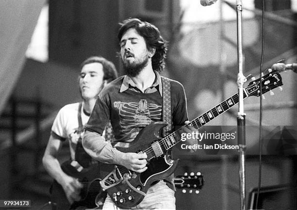 Micky Jones and Alan 'Tweke' Lewis from Man perform live on stage at Alexandra Palace, London in 1973