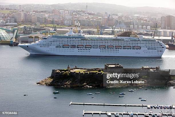 Ocean passenger ship travel from the port of A Coruna forward the San Ant�n castle, Galicia region, 7th April 2009