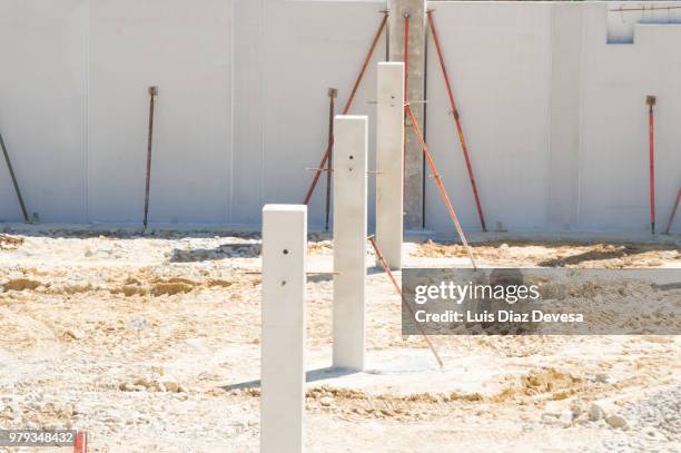 foundation holes at different stages - ferro metal stock pictures, royalty-free photos & images