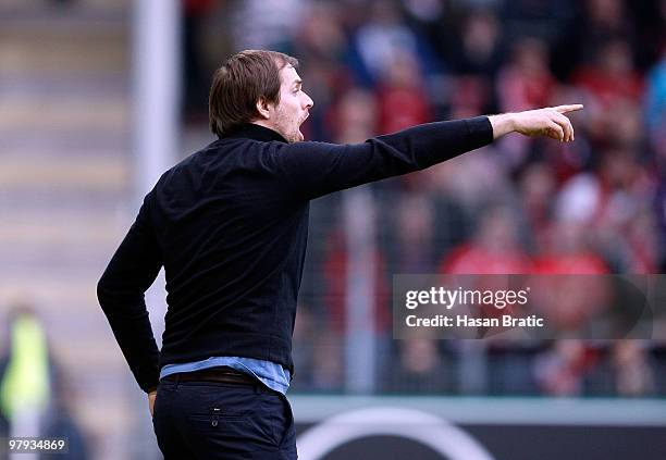 Head coach Thomas Tuchel of Mainz gestures during the Bundesliga match between SC Freiburg and FSV Mainz 05 at Badenova Stadium on March 20, 2010 in...