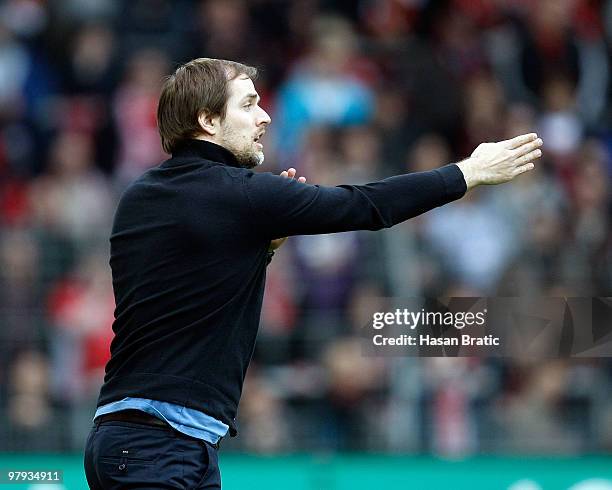 Head coach Thomas Tuchel of Mainz gestures during the Bundesliga match between SC Freiburg and FSV Mainz 05 at Badenova Stadium on March 20, 2010 in...