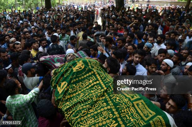 People carry the body of 25 years old Aijaz Ahmad Bhat, a civilian who was killed By Indian Army near his Home in Nowpora area of south Kashmir's...