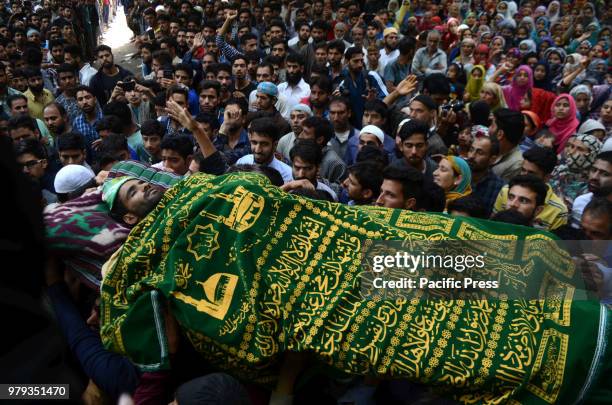 People carry the body of 25 years old Aijaz Ahmad Bhat, a civilian who was killed By Indian Army near his Home in Nowpora area of south Kashmir's...