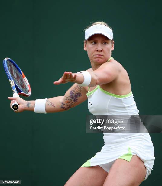 Bethanie Mattek-Sands of the United States in action against Karolina Sprem of Croatia in the Womens Singles first round on day one of the 2010...