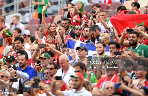 Ana Sofia Gomes, Joao Moutinho's wife waves while Georgina Rodriguez, Cristiano Ronaldo's girlfriend sits next to her during the 2018 FIFA World Cup...