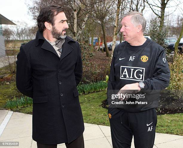 Sir Alex Ferguson of Manchester United meets former player Eric Cantona at Carrington Training Ground on March 22 2010 in Manchester, England.