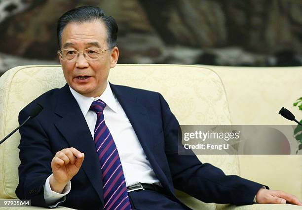 Chinese Premier Wen Jiabao answer a question during a meeting with entrepreneurs from various countries at China Development Forum at the Great Hall...