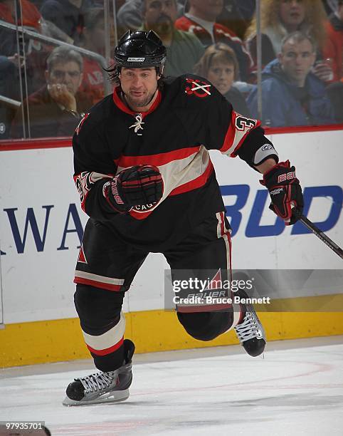 Adam Burish of the Chicago Blackhawks skates against the Philadelphia Flyers at the Wachovia Center on March 13, 2010 in Philadelphia, Pennsylvania.