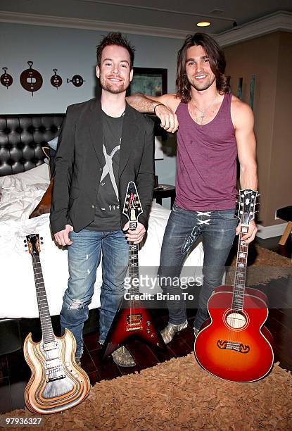 David Cook and Justin Gaston pose for a photo at the "If I Can Dream" house on March 18, 2010 in Los Angeles, California.