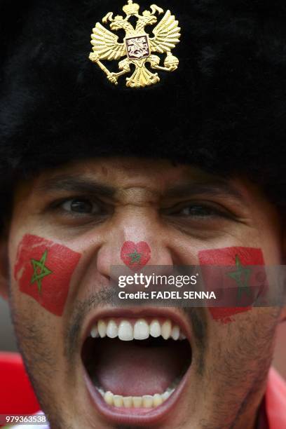 Morocco's fan looks on prior to the Russia 2018 World Cup Group B football match between Portugal and Morocco at the Luzhniki Stadium in Moscow on...