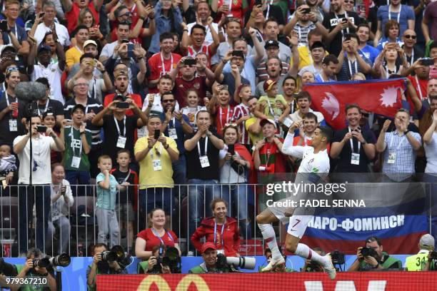 Portugal's forward Cristiano Ronaldo celebrates after scoring a goal during the Russia 2018 World Cup Group B football match between Portugal and...