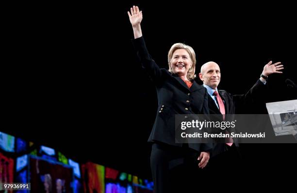 Secretary of State Hillary Rodham Clinton and American Israel Public Affairs Committee president Lee Rosenberg wave to the crowd during the 2010...