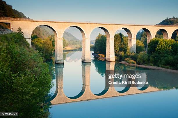 bridge over the river durance in sisteron, france - sisteron fotografías e imágenes de stock