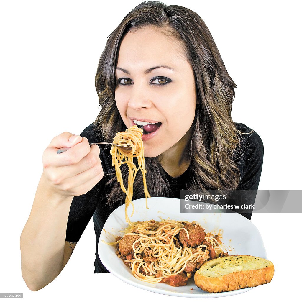 Portrait of girl eating  of spaghetti