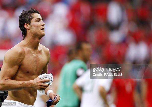 Portuguese forward Cristiano Ronaldo is pictured without his shirt after the Euro 2008 Championships Group A football match Czech Republic vs....