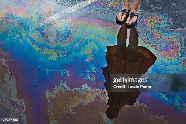 another type of rainbow - puddle reflection stock pictures, royalty-free photos & images