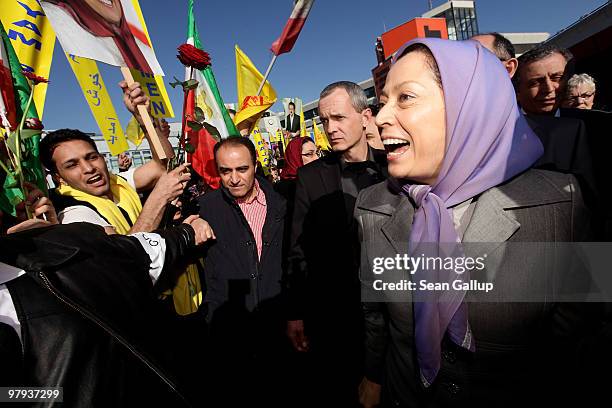 Maryam Rajavi , president of the National Council of Resistance of Iran, greets several hundred Iranian expatriates who had gathered to welcome her...