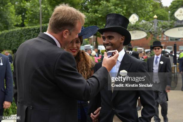 Sir Mo Farah , Tania Nell and a guest attend day 2 of Royal Ascot at Ascot Racecourse on June 20, 2018 in Ascot, England.